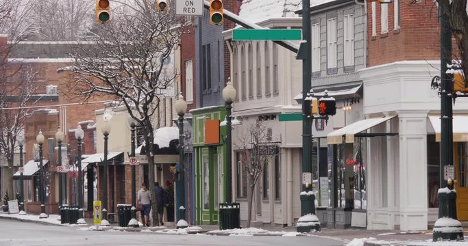 A long shot of a small American town's business district in the winter season. Pittsburgh suburbs. Non-snowing version.	 	