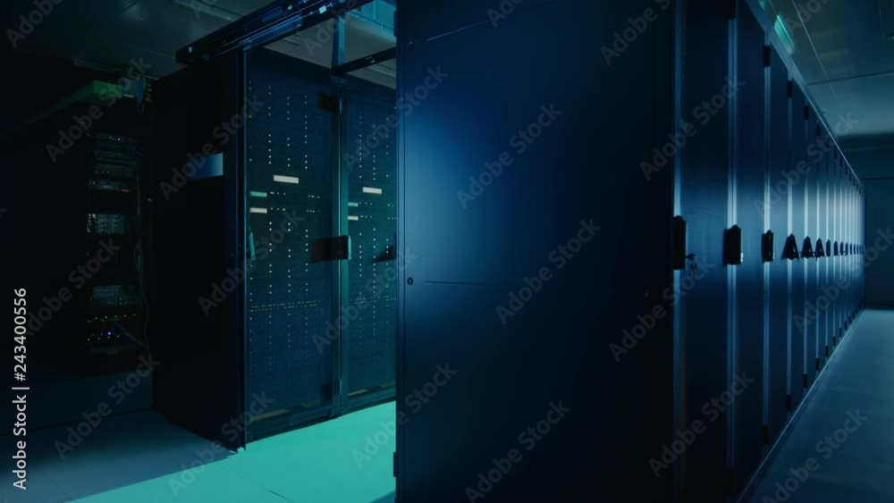 Aufkleber Camera Slide-Trough Shot of a Working Data Center With Rows of Rack Servers. Led Lights Blinking and Computers are Working. Dark Ambient Light.