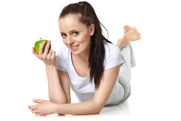 Young beautiful woman with an apple.