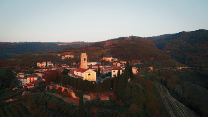 Fototapeta na wymiar Aerial view of a typical small village in the Italian hills.