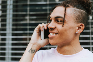 Young guy talking on the phone