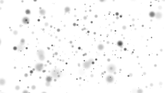 Little dark particles falling and flying on the white background. Wallpaper for your logo or advertisement image or video.