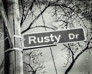 Rusty Name Street Sign