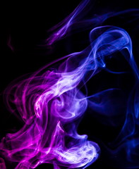 Colored smoke on black background