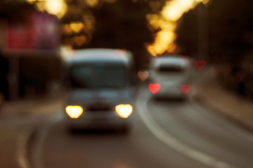 Road to defocus lights cars heart motorcycle in the evening