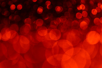 Defocused Valentine's day background. Red bokeh concept.