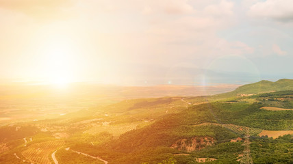 Dramatic sundown over fields around Delphi