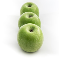 Green apples isolated on white background