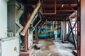 Abandoned flour milling factory. Old rusty grain cleaning air separation machines 