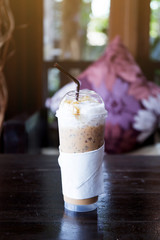 Iced coffee on table