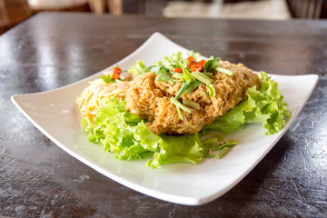 Crispy Catfish Salad Served white plate