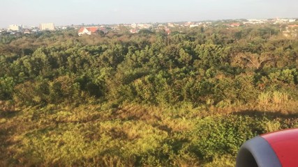Airplane Landing landscape outside the window