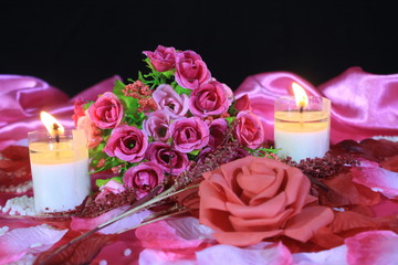 Dating Valentine day with decoration flower rose and candle burning