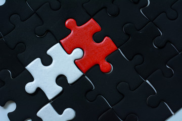 Obraz premium red , white and black Jigsaw puzzle background