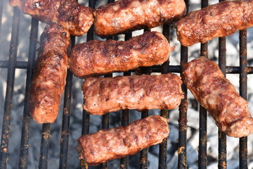  traditional romanian barbecue raw meat ,mici, mititei,(cevapcici), pork meat rolls