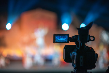 The video camera is broadcast live on stage.
