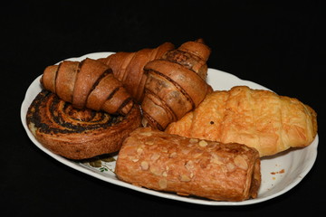 porcelain platter with Croissants, donuts, crullers