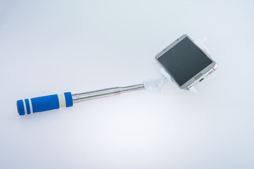 Selfie stick with mobile phone