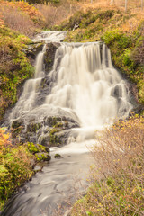 Fototapeta na wymiar Waterfall in Highlands of Scotland