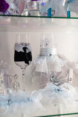 Accessory for the wedding. Candles. Wine glasses.Decorated wedding accessories A set of wedding accessories, decorated in Colored tapes and jewelry