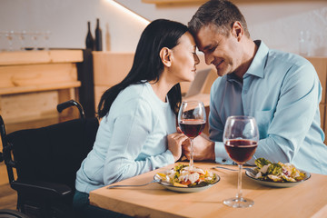 Enamored couple having a romantic dinner