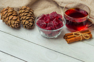 Homemade cranberry marmalade on a light background