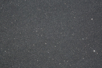 Black beach sand with shiny white spec