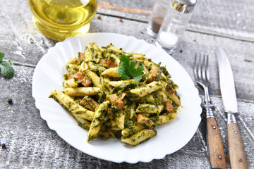 Penne pasta with spinach and meat