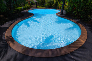 Round pool shaped pool surrounded by trees,Swimming Pool and Water Filter