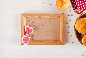 Muffins with pumpkin. Cupcakes with Valentine's Day decor. Flat lay. Top view.