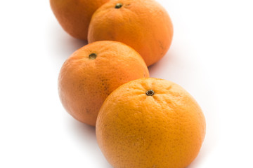 Ripe mandarines isolated on a white background