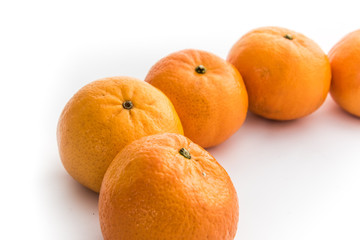 Ripe mandarines isolated on a white background