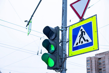 traffic lights with road signs