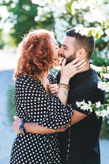 loving guy and girl posing together on camera