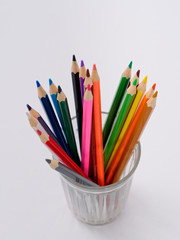 colored pencils sharpened on a white background.