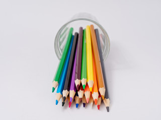 colored pencils sharpened on a white background.