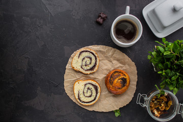 coffee, bun with poppy seeds (sweet food, snack). top, food background copy space