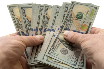 Money dollars in hands on white background isolation