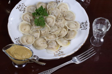 Homemade dumplings with cherries and raspberries