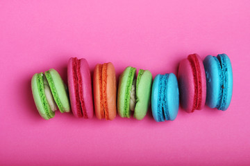 A row of bright macaroons of different color	