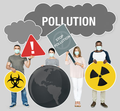 Diverse people holding stop pollution icons