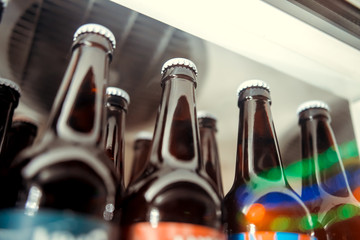Bottles of beer in a fridge