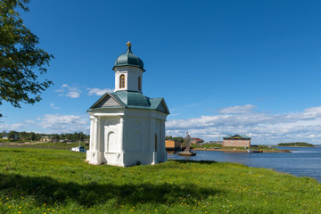 Fototapeta na wymiar Chapel of Alexander Nevsky of the Spaso-Preobrazhensky Solovetsky Monastery. Embankment of Prosperity Bay, Solovki Islands, Arkhangelsk region, White Sea