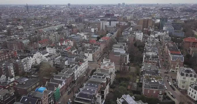 Aerial: the traditional cityscape of Amsterdam in snowless winter
