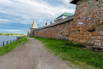 The road along the fortress wall of the Transfiguration Solovki monastery. Russia, Arkhangelsk region, Primorsky district, Solovetsky village