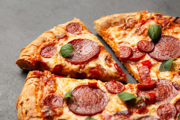 Pizza with salami and chorizo