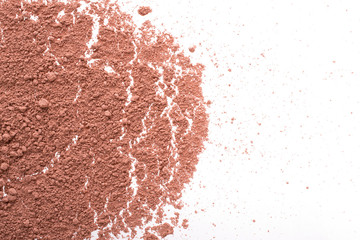 Cosmetic background, minerl clay texture. Mask dry clay for facecare and bodycare. Isolated on a white background. Texture of  makeup powder - blush or eyeshadow.