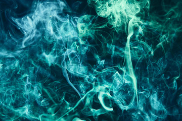 White smoke on black background