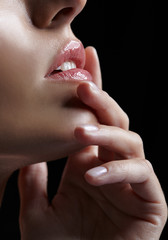 Girl with  finger on lips