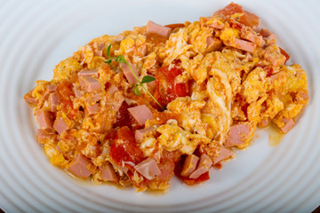 Scramble with sausages
